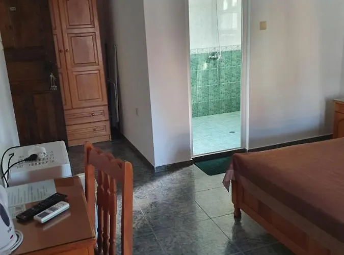 къщаперла Отель