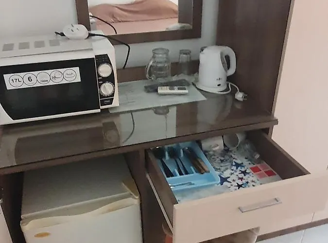 къщаперла Отель